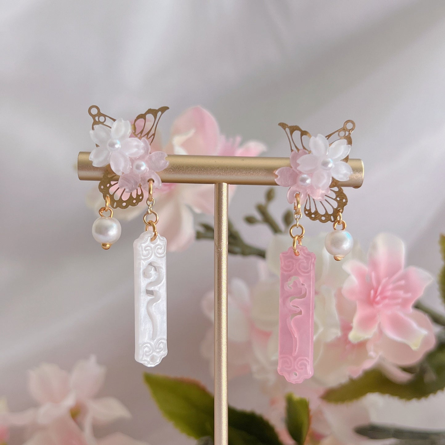 Asymmetric sakura butterfly studs