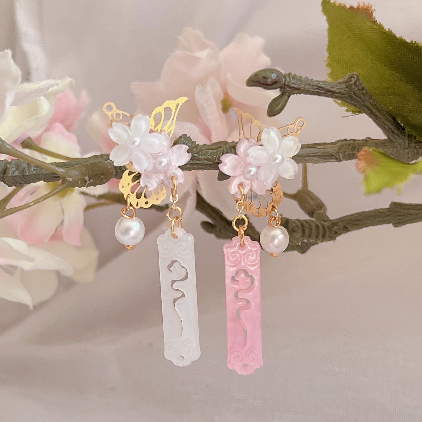 Asymmetric sakura butterfly studs