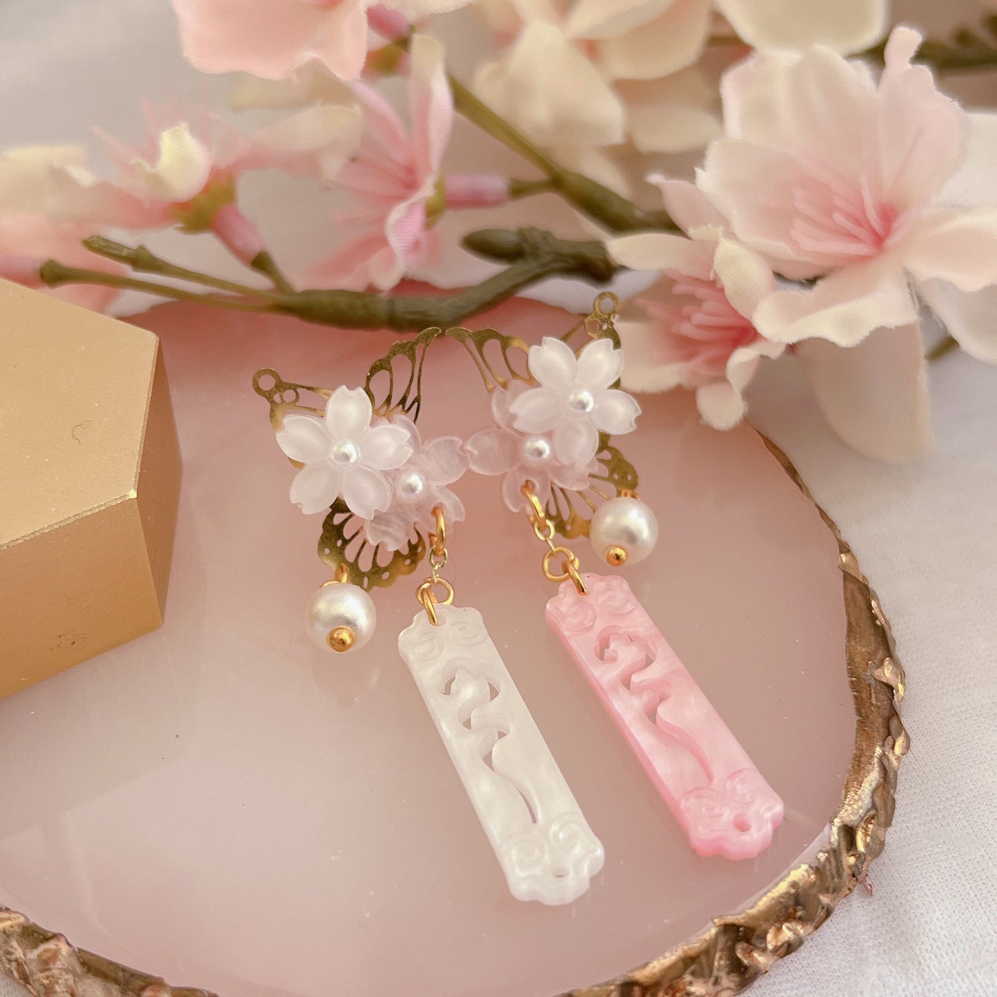 Asymmetric sakura butterfly studs